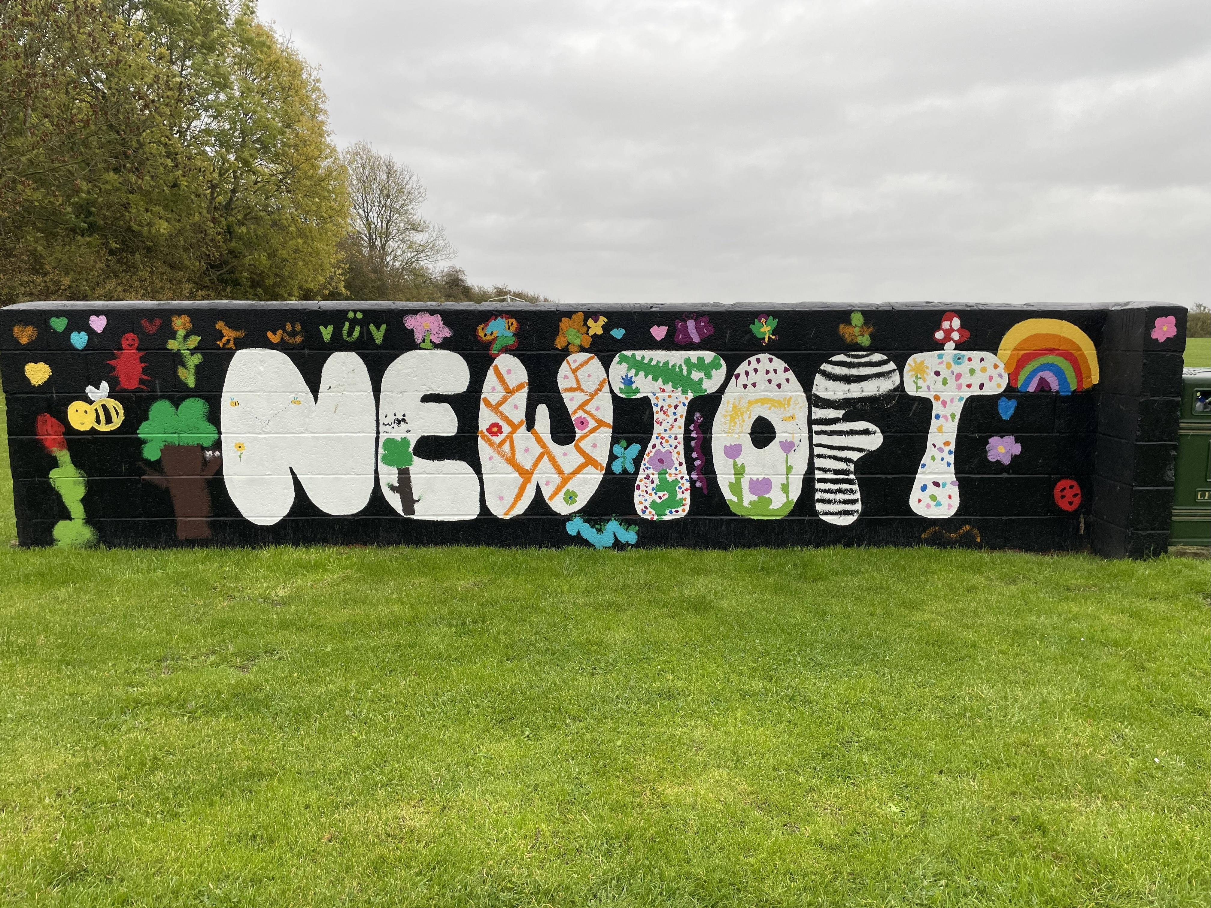 A photograph of the painted wall at the Newtoft Field.